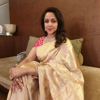 Savitri Devraj (ML mother)