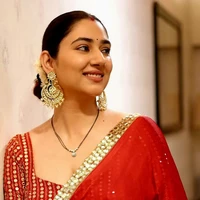 Meera Malhotra (ML mother)