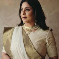 Amrita Sharma( fl mother)