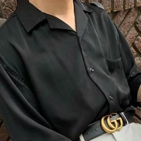 K.
