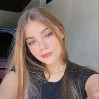 Lucy García(Ex novia de Asher)