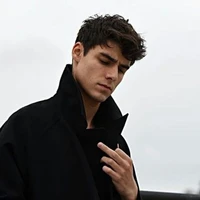 TREVOR RHIN
