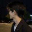 T.