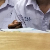 E.
