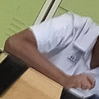 T.